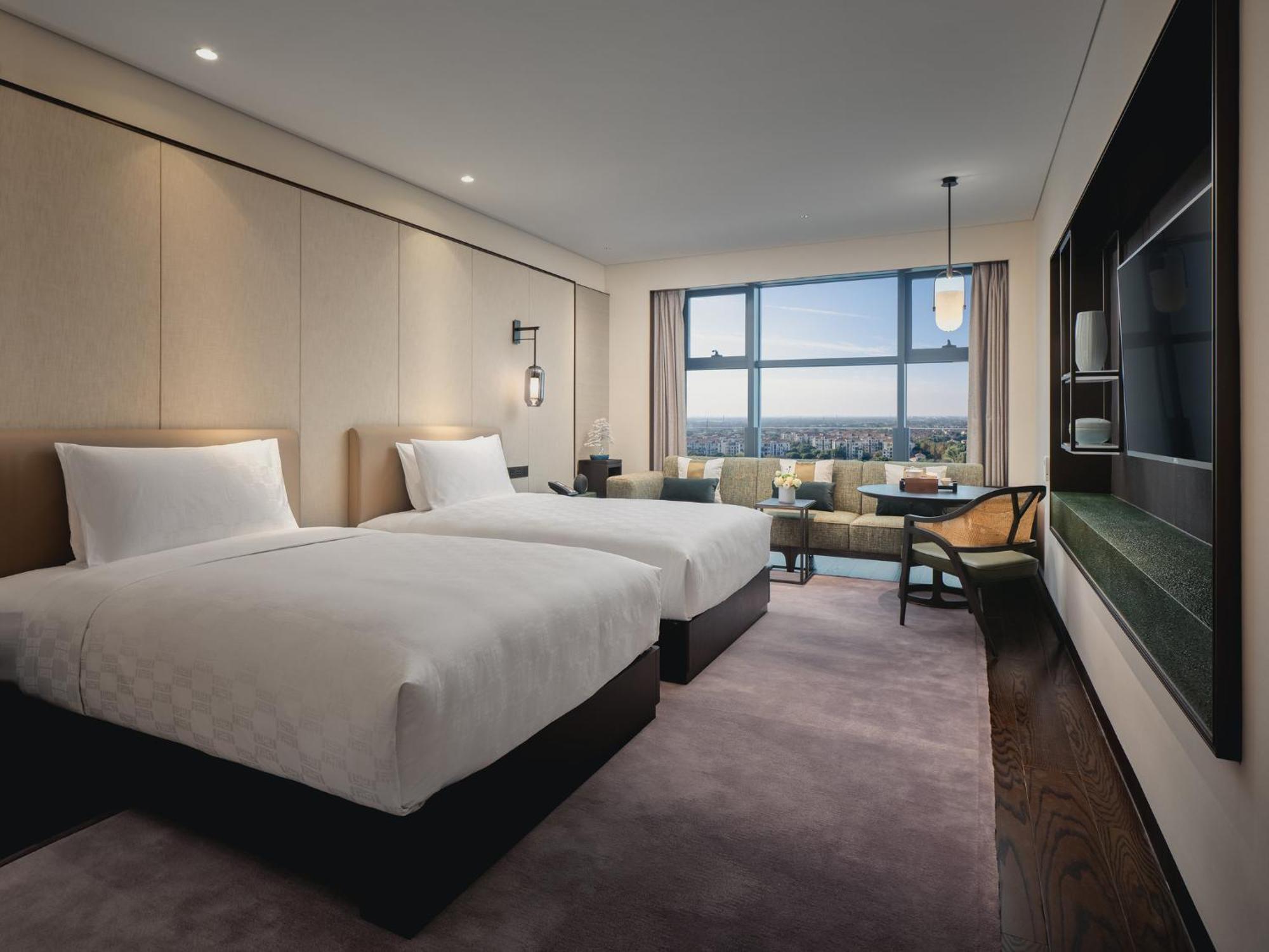 Hualuxe Kunshan Huaqiao By Ihg - F1 Racing Preferred Hotel Exterior photo